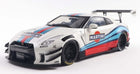 1:18 scale diecast racing model car in white with Martini livery and large rear wing