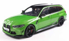 1:18 scale green diecast BMW M3 Touring model car with black roof and detailed wheels