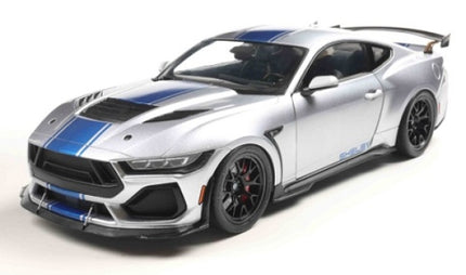 1:18 scale diecast silver Shelby Mustang model car with blue racing stripes, detailed exterior