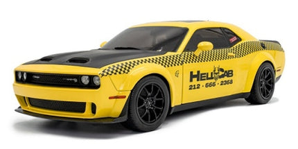Yellow diecast Dodge Challenger model car with black hood and taxi-themed decals