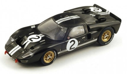1:18 scale black diecast Ford GT40 model car with white racing stripes and number 2 decals