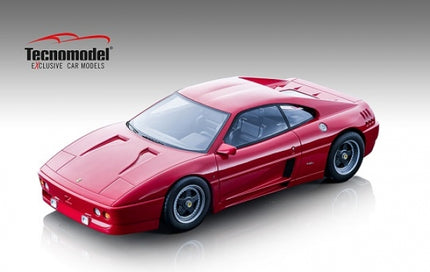 Red diecast model car in 1:18 scale, sleek coupe design, displayed on light background