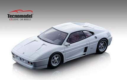 White diecast Ferrari 1:18 scale model car with detailed exterior, displayed on a plain background