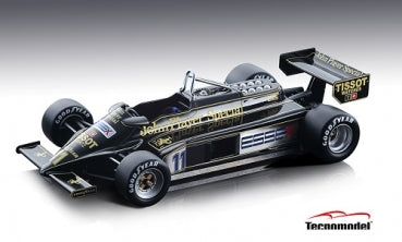 1:18 scale black and gold diecast Formula 1 race car model with sponsor decals