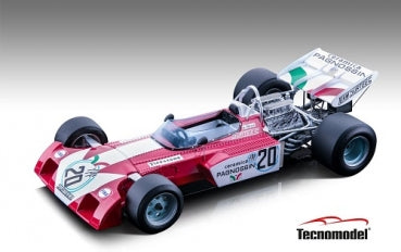 Red and white diecast Formula 1 model car with exposed engine and racing decals