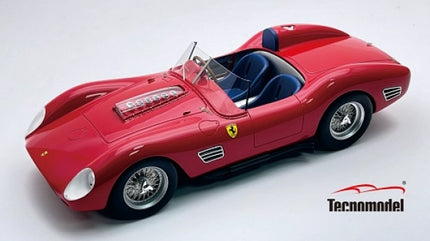 1:18 scale red Ferrari diecast model car with blue interior on white background