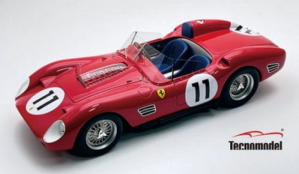 Red diecast Ferrari race car model with number 11, detailed engine, and blue seats