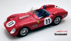 Red diecast Ferrari race car model with number 11, detailed engine, and blue seats