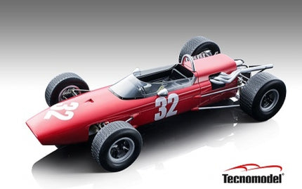 Red diecast vintage Formula 1 model car with number 32, open cockpit, by Tecnomodel.