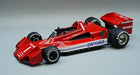 Red diecast Formula 1 model car with Parmalat and Goodyear branding, 1:18 scale