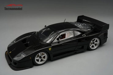 Black Ferrari F40 diecast model car 1:18 scale with detailed exterior and rear wing.