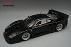 Black 1:18 scale diecast Ferrari F40 model car with detailed interior and rear spoiler