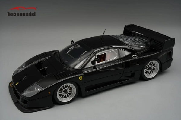 Black 1:18 scale diecast Ferrari F40 model car with detailed interior and rear spoiler