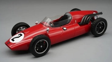 Red diecast model vintage race car with number 2 decal, black wheels, and detailed exhaust pipes
