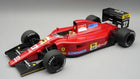 1:18 scale red diecast Ferrari Formula 1 model car with detailed sponsor decals