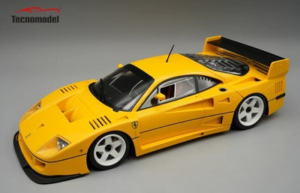 Yellow Ferrari F40 1:18 scale diecast model car with white wheels and black spoiler
