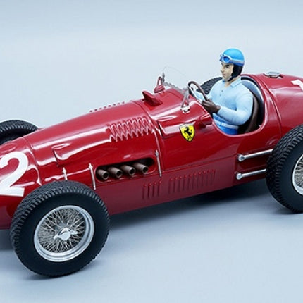 1:18 scale red diecast Ferrari race car model with driver figure and number 12 on body
