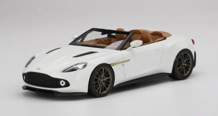 White convertible diecast model car with tan interior, 1:18 scale, on white background