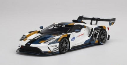 1:18 scale diecast model of a Ford GT race car with multicolor livery and rear wing
