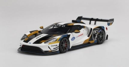 1:18 scale diecast Ford GT model car, white with gold and black racing livery, rear wing spoiler