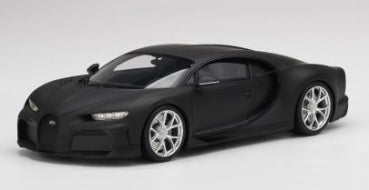 Matte black diecast model sports car with silver wheels, 1:18 scale, on white background