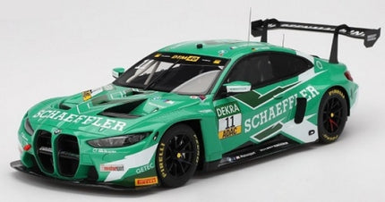 Green diecast BMW M4 GT3 model race car with Schaeffler livery, detailed 1:18 scale.