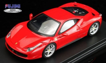 Red Ferrari diecast model car 1:18 scale displayed on black base, detailed exterior