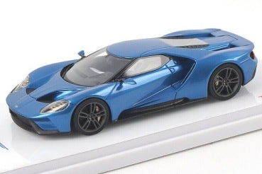 Blue 1:18 scale diecast model sports car with detailed exterior on display stand