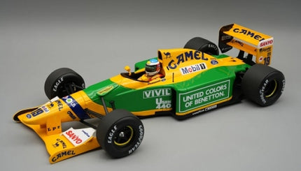 Diecast 1:18 scale Benetton Formula 1 model car in yellow and green with detailed sponsor logos