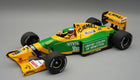 Diecast 1:18 scale Benetton Formula 1 model car in yellow and green with detailed sponsor logos