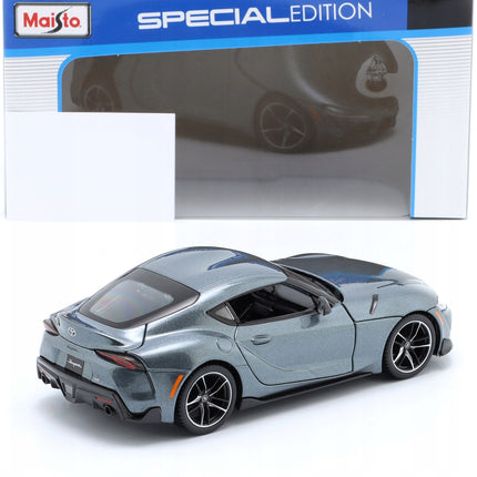 https://a.allegroimg.com/original/11d5c7/fbdac51e41b599723f59630a7dfa/Toyota-GR-Supra-2022-Deep-Grey-Maisto-1-24-1-24-Szary-Model-Samochodu-32917-Skala-skale-1-19-do-1-25