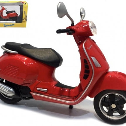 Red Vespa diecast model scooter with box, 1:18 scale collectible toy motorcycle.