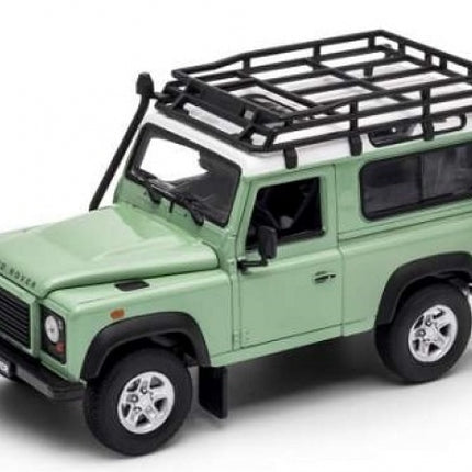 1:24 scale diecast Land Rover Defender model car, green with roof rack, detailed exterior