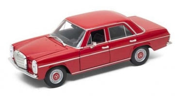 Red classic diecast model car in 1:24 scale, four-door sedan with chrome details