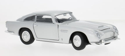 Silver classic diecast model car 1:24 scale, vintage coupe design on white background