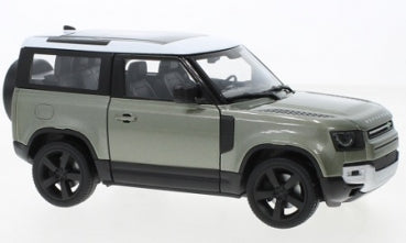 1:24 scale diecast model of a green Land Rover Defender with black wheels