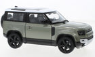 1:18 scale green diecast model SUV with black rims and white roof, detailed interior