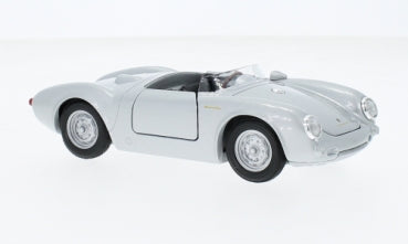 Silver diecast model classic convertible car in 1:24 scale on white background