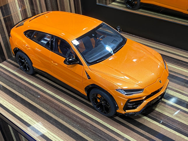 AutoArt Lamborghini Urus 2018 Orange Metallic 1:18 Diecast Model Car - studio product photo of the scale model