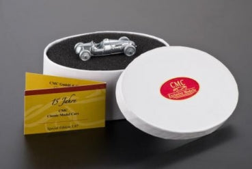 Silver diecast model car in round display box with certificate, collectible gift set