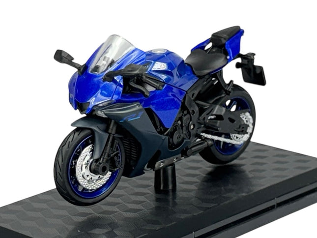 Blue diecast model sport motorcycle on display stand, detailed 1:18 scale collectible