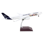 https://cdn.shopify.com/s/files/1/0504/9925/6496/products/airbus-a330-300-commercial-aircraft-lufthansa-diversity-wins-white-with-blue-tail-gemini-200-series-1200-diecast-model-airplane-by-geminijets-863374.jpg?v=1748420671