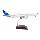 https://cdn.shopify.com/s/files/1/0504/9925/6496/products/airbus-a330-900-commercial-aircraft-garuda-indonesia-white-with-blue-tail-gemini-200-series-1200-diecast-model-airplane-by-geminijets-709010.jpg?v=1748420673