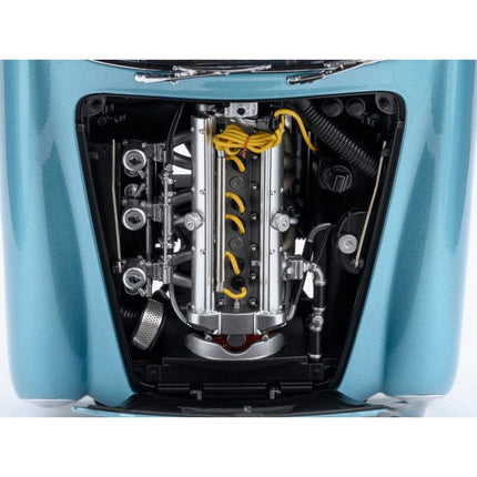 https://cdn.shopify.com/s/files/1/0504/9925/6496/files/aston-martin-db5-rhd-right-hand-drive-caribbean-pearl-blue-metallic-118-model-car-by-autoart-258520.jpg?v=1756087280
