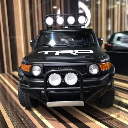 AutoArt Toyota FJ Cruiser Black 1:18 Diecast Model Car - studio product photo of the scale model