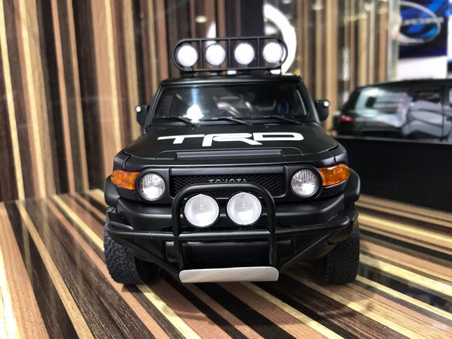 AutoArt Toyota FJ Cruiser Black 1:18 Diecast Model Car - studio product photo of the scale model