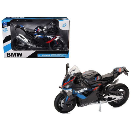 https://cdn.shopify.com/s/files/1/0504/9925/6496/files/bmw-m-1000-rr-motorcycle-black-with-red-and-blue-stripes-112-diecast-model-by-new-ray-442347.jpg?v=1748403643