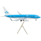 https://cdn.shopify.com/s/files/1/0504/9925/6496/products/boeing-737-700-commercial-aircraft-with-flaps-down-klm-royal-dutch-airlines-blue-with-white-tail-gemini-200-series-1200-diecast-model-airplane-by-geminijets-206524.jpg?v=1748420659