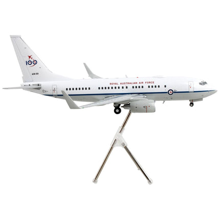 https://cdn.shopify.com/s/files/1/0504/9925/6496/products/boeing-737-700-transport-aircraft-royal-australian-air-force-100th-anniversary-a36-001-white-and-gray-gemini-200-series-1200-diecast-model-airplane-by-geminijet-986929.jpg?v=1748420661