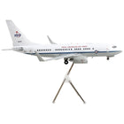 https://cdn.shopify.com/s/files/1/0504/9925/6496/products/boeing-737-700-transport-aircraft-royal-australian-air-force-100th-anniversary-a36-001-white-and-gray-gemini-200-series-1200-diecast-model-airplane-by-geminijet-986929.jpg?v=1748420661